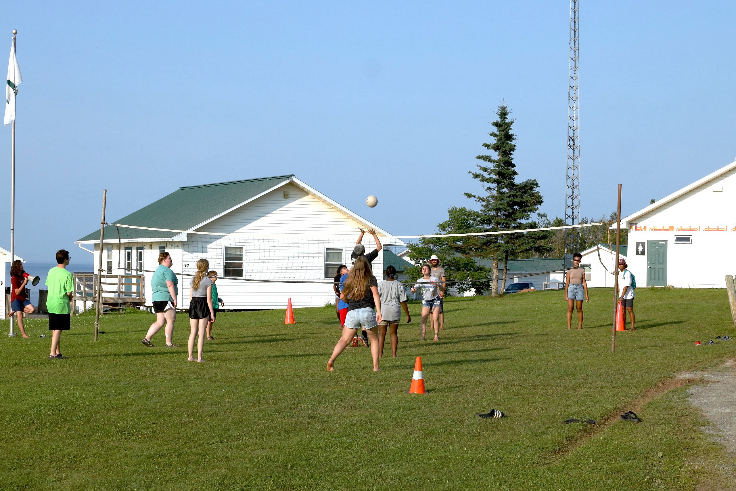 Group of teens playing volleyball